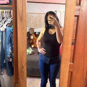 Black Tank Top and Blue Jeans